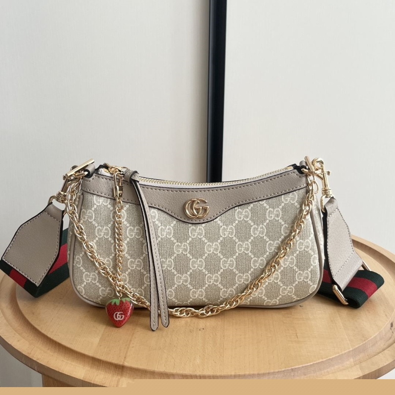 G*u*i top handle bags